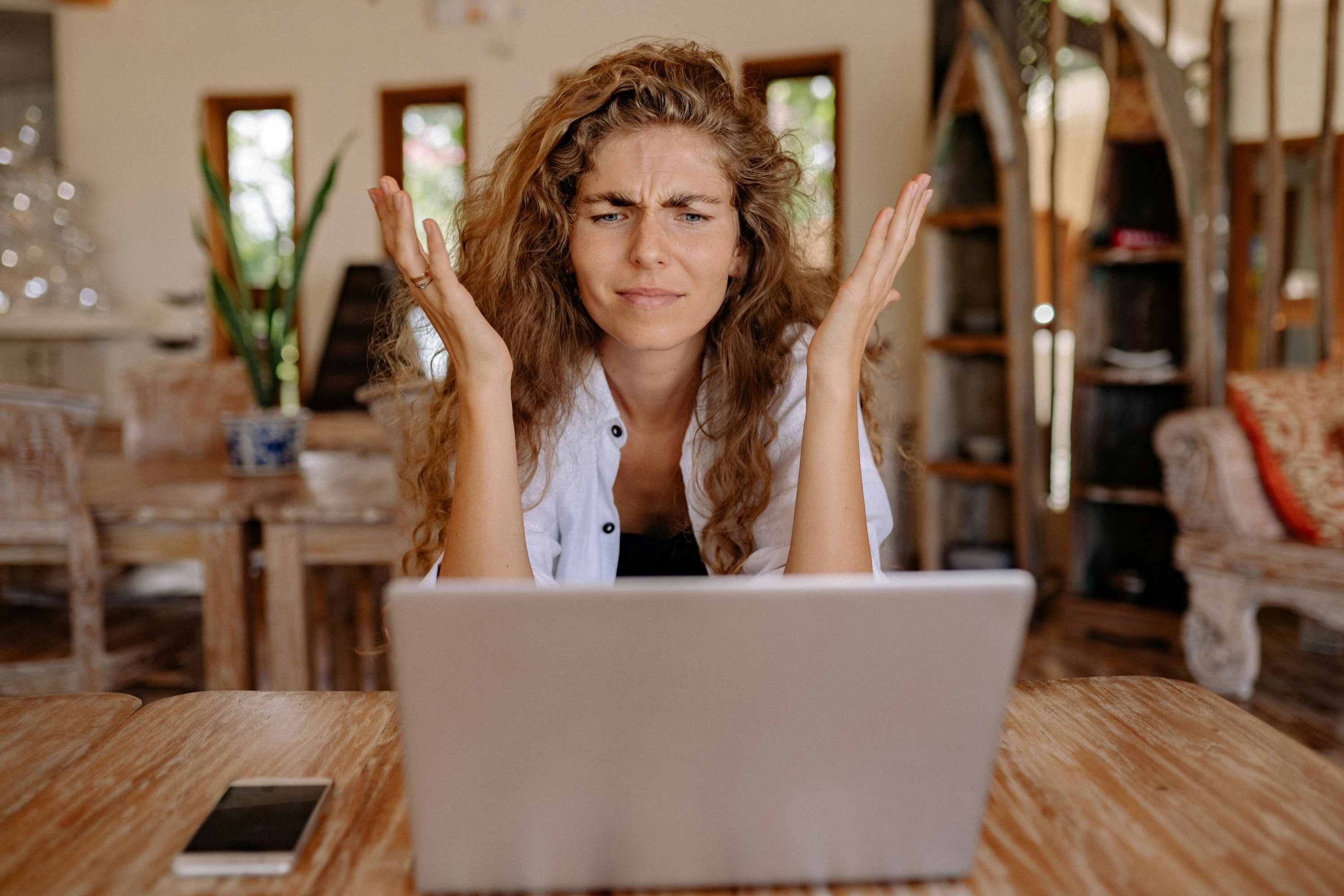 Lady confusingly staring at laptop